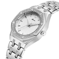 Detailed macro shot of silver quartz watch featuring rhinestone bezel and mesh dial - Silver