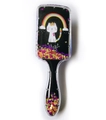 Detail of magic cat hairbrush showing flowing glitter and colorful sequins inside - Black Cat Glitter