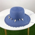 Dark blue woven straw hat with shell charms and elegant wavy brim for summer beachwear - M (56-58cm) / Navy Blue - Bucket Hat Style