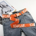 Detail view of orange canvas belt with white graffiti letters and silver double D-ring buckle - Orange