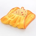Detail of yellow coral velvet hand towel with apple pattern and hanging loop design - Yellow