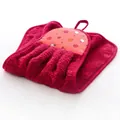 Detail of red dress-shaped hanging towel in coral fleece with apple pattern print - Red
