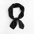 Detailed view of a black silk scarf tied in a knot, smooth satin texture on white background - Black