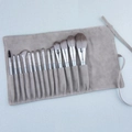 Complete 14-piece makeup brush set with light blue handles and grey roll-up storage bag - With Roll-up Insert Bag (Light Blue)