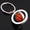 Rotierender Basketball-Schlüsselanhänger mit Silbermetallrahmen und orangefarbenem Ball - Rotierender Basketball