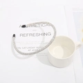 Sparkling silver headband with full rhinestones and black rubber tips on white background - White