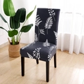 Navy blue stretch chair cover with white fern leaf patterns for hotel and dining chairs - Night Shadow
