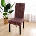 Modern stretch chair cover in dark reddish-brown with black linear patterns - Heather Coffee