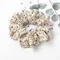 Floral scrunchie detail in cream fabric with brown botanical prints and soft texture - Beige Bellflower