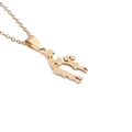 Close-up of golden mother and child silhouette pendant on stainless steel necklace - Gold Mother Child Silhouette Style