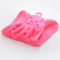 Detail of pink coral velvet hanging hand towel with apple pattern and soft texture - Pink