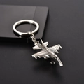 Detailed view of silver metal fighter jet keychain showing metallic texture and finish - Supersonic Recon Plane (飞机11)