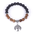 Black lava stone and brown wood bead bracelet featuring a silver Tree of Life charm - Wenge Wood Style