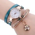 Fashionable wrap watch for women with blue snakeskin leather strap and crystal accents - Winding Bowknot Pendant / Sky Blue