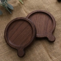 Set of two round dark walnut wood coasters with small handles and natural grain - Black Walnut with Handle 9.2cm