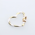 Macro detail of heart-shaped gold and white enamel screw lock clasp for DIY necklaces - DM248-2 Heart White