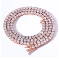 Detailed view of rose gold tennis chain with brilliant round cut clear cubic zirconia stones - 4mm Width - 15cm Length / Rose Gold