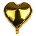 Close-up of golden heart-shaped foil balloon with metallic finish and inflation port - Gold
