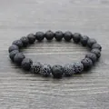 Lava rock yoga bracelet with black volcanic beads and blue cracked agate accents - Black Weathered Stone