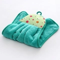 Detail of hanging green coral fleece hand towel with cartoon apple pattern for kitchen use - Green
