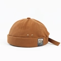 Dettaglio del berretto da marinaio in tela marrone con patch vintage e occhielli - Regolabile / caffè