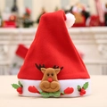 Kids red Christmas hat with plush reindeer doll and green holly leaf accents - Kids Finger Reindeer Style
