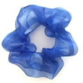 Blue organza scrunchie hair tie with fluffy translucent texture on white background - Blue