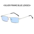 Vintage rechthoekige zonnebril met zilveren metalen montuur en lichtblauwe glazen - Zilveren Frame Blauwe Glazen