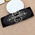 Women's black elastic waist belt with an ornate vintage silver metal buckle detail - EL76