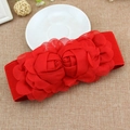 Women's red elastic waist belt featuring large dual rose fabric flower decorations - 65cm / Red