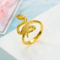 Macro detail of golden cobra wrap ring showing realistic scale texture and snake head - Double S Snake Gold