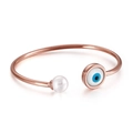 Rose gold evil eye open bangle with pearl accent on a minimalist white background - Round Evil Eye (KB123060-K)