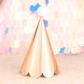 Rose gold metallic party hat featuring a fluffy white pom pom and scalloped edge detail - Rose Gold Sequin Ball Hat