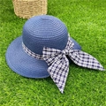 Navy blue woven straw beach hat with black and white checkered bow tie for women - M (56-58cm) / Navy Blue