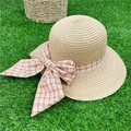 Women's straw sun hat with orange checkered ribbon bow on green grass background - M (56-58cm) / Khaki