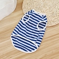 Blue and white striped cotton dog vest with white edging for small pets, flat lay view - Sleeveless Blue