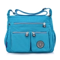Waterproof nylon multi-pocket crossbody bag for women in cyan blue with adjustable strap - Sky Blue