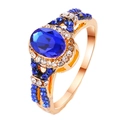 Elegant gold ring with oval blue zircon and pavé setting on a hollow band - US 6 / Blue Main Stone Gold Style