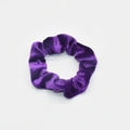 Close-up of violet velvet scrunchie showing rich fabric texture and elastic pleats - Violet