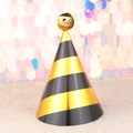 Birthday party hat with gold and black stripes featuring a gold sequin pompom top - Black Gold Stripe Sequin Ball Hat