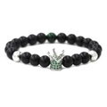 Detail of 8mm matte black beads bracelet featuring a silver crown with green zircons - Matte Black Stone White Gold Green Zircon Crown