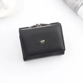 Short black trifold wallet for women featuring a golden heart and kiss-lock coin pocket - Black
