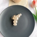 Elegant large pearl hair claw clip with transparent plastic base on minimalist background - Medium Size (7cm)