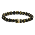 Close-up of 8mm black beads with golden mantras and a crystal-encrusted crown charm - Six-Word Mantra Gold Small Crown / Gold
