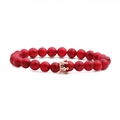 Close-up of red turquoise beaded bracelet with rose gold crown charm and zircon inlay - Red Turquoise Rose Gold Crown