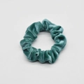 Detail shot of the deep teal velvet corduroy fabric texture on the hair scrunchie - Teal