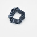 Detail shot of a dark grey velvet scrunchie showing soft texture and high elasticity - Dark Gray