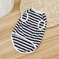 Classic black and white striped dog vest in breathable summer fabric on wooden desk - Sleeveless Black