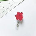 Detail of red bear acrylic retractable badge holder with metal snap and clear strap - Red