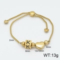 Adjustable gold stainless steel bracelet featuring letter K bead and heart charm - Letter K